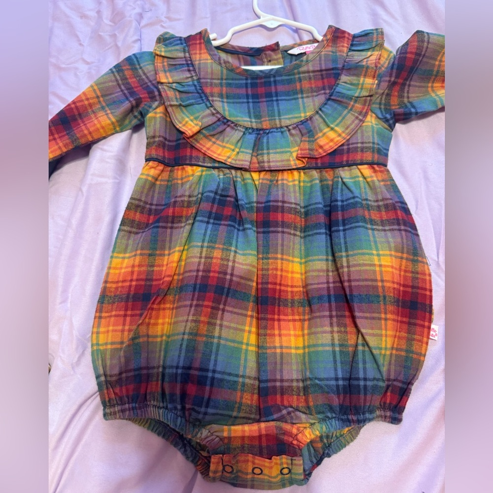 It has never been worn before. Fall color romper